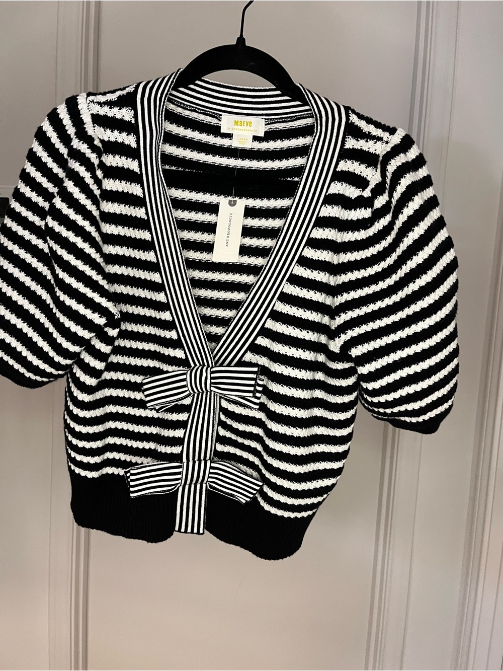 Maeve Black and White Striped Short-Sleeve Cardigan with Bow Accents